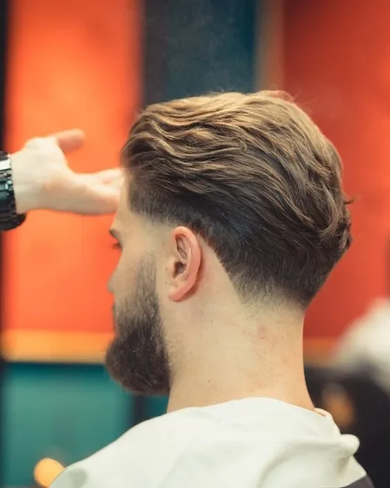 High-Volume Brush Back with Mid Skin Fade & Beard