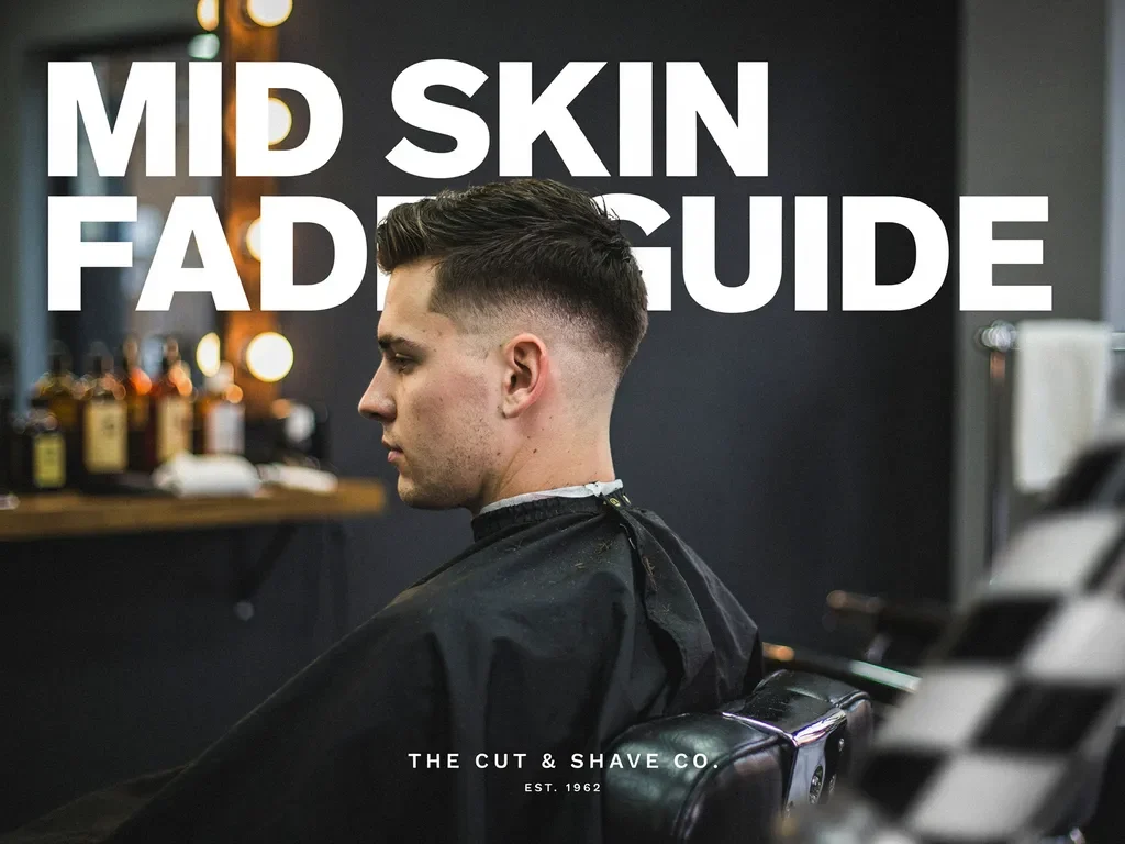 mid skin fade haircut with a bald finish at the temple