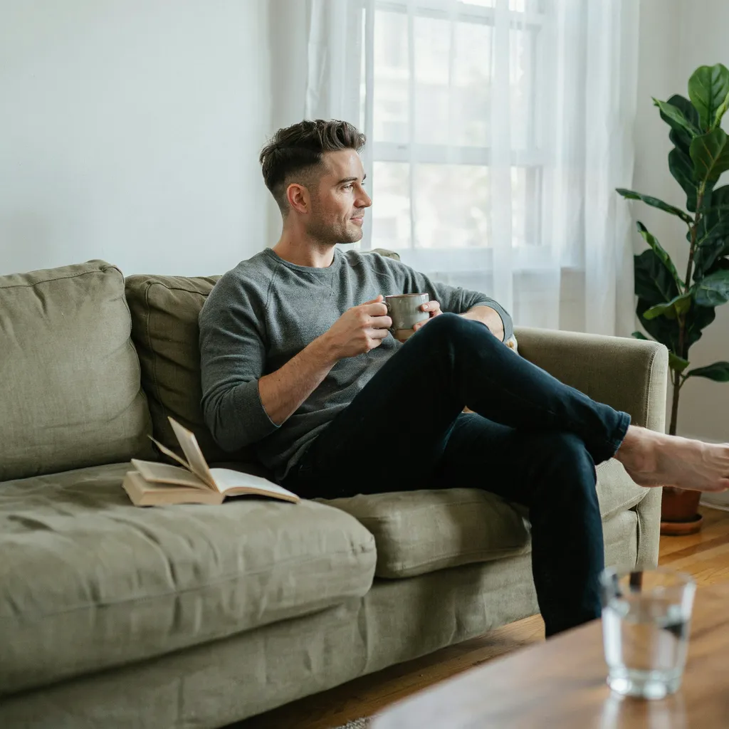 Relaxed man with a slightly grown out fade haircut