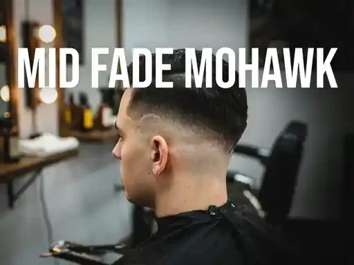 mid fade mohawk haircut with a center strip of length
