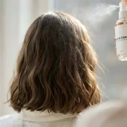 sea salt spray applied to wavy hair